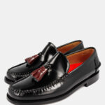 Castellanos negro con borlas burdeos